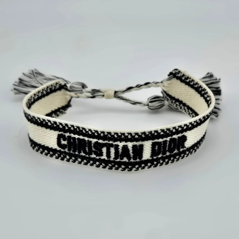 Christian Dior J'Adior Friendship Bracelet Black White Woven Cotton Tassel